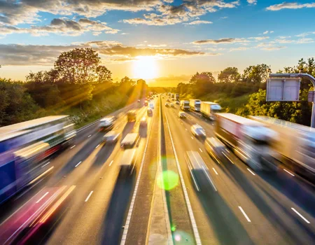 fleets of vehicles driving on motorway
